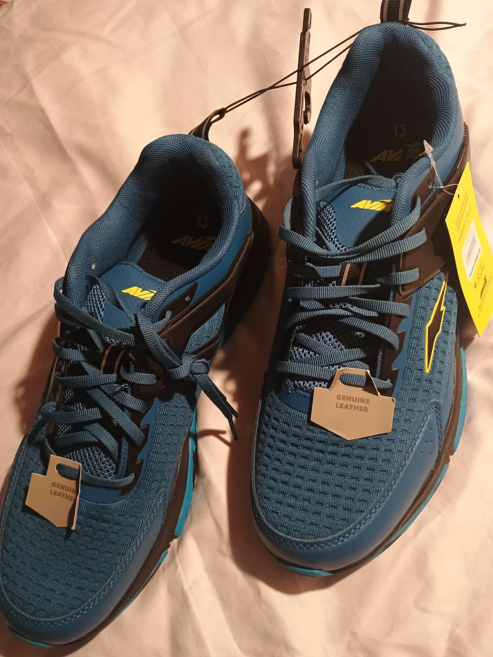 Avia Men's Blue and Black Athletic Running Shoes with Yellow Accent